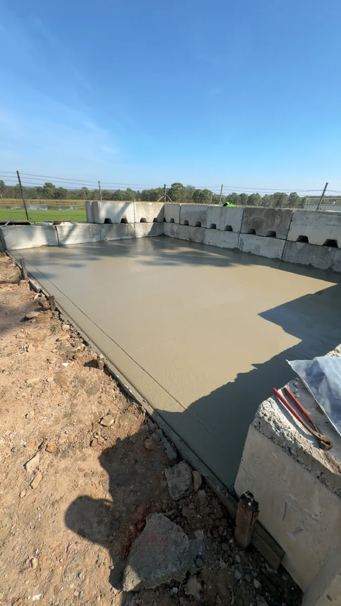Concreting & Excavations project — Wide view of a laser-levelled structural slab pour