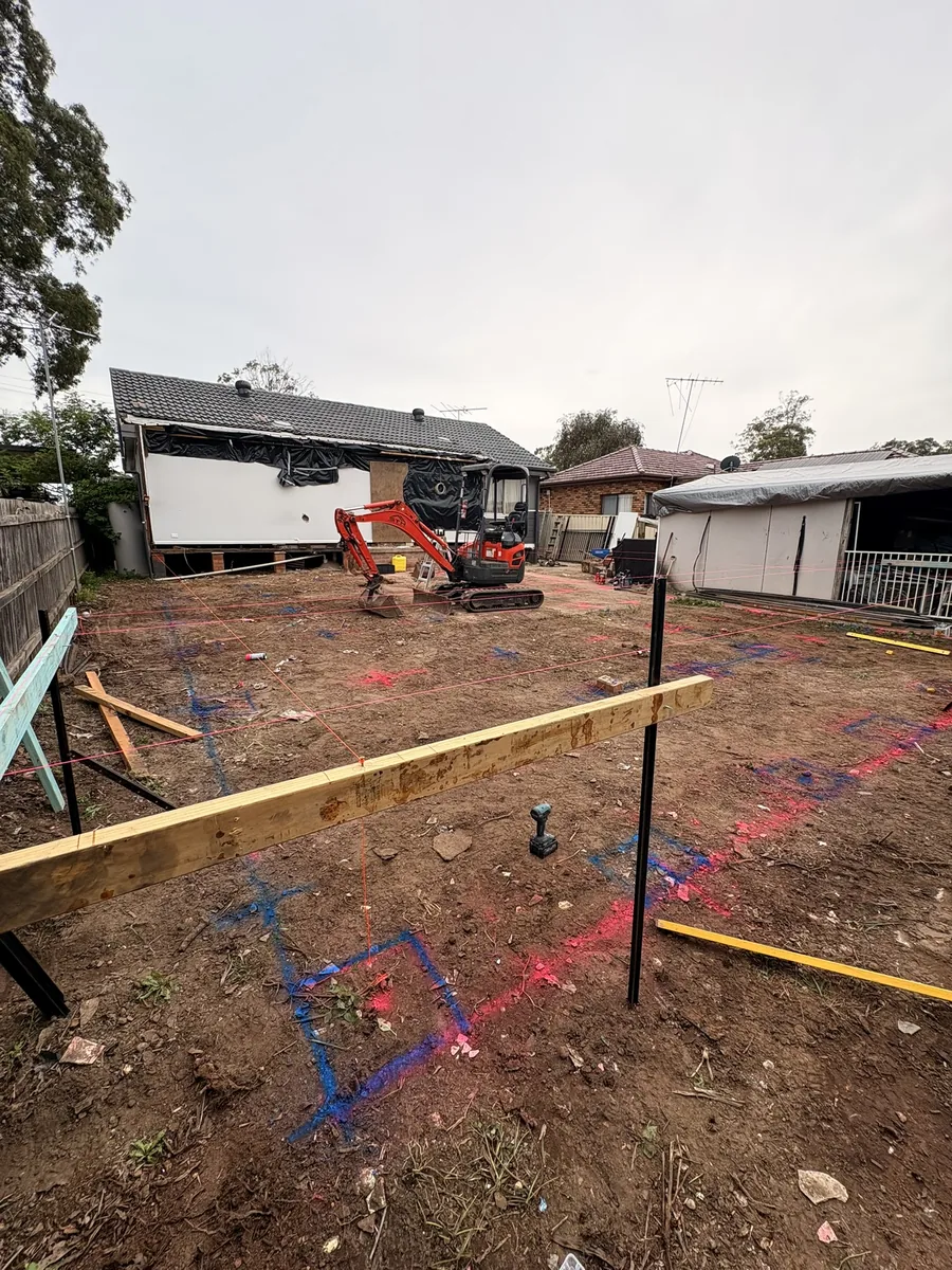Excavator preparing a residential site for concreting in Western Sydney