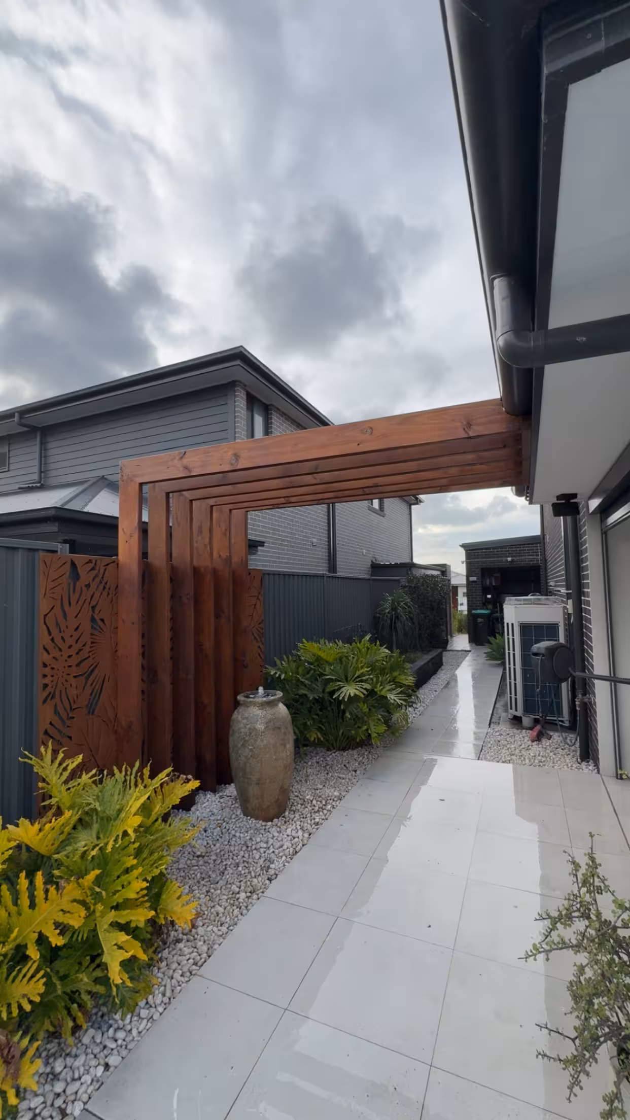 Pergolas & Carports project — Timber batten awning feature against a home exterior